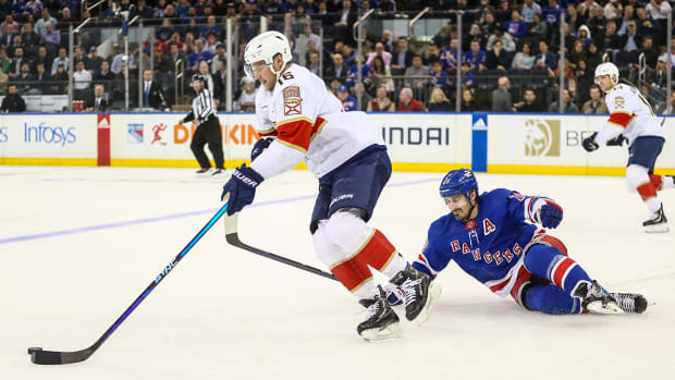 Florida Panthers forward Aleksander Barkov controls the puck against the New York Rangers